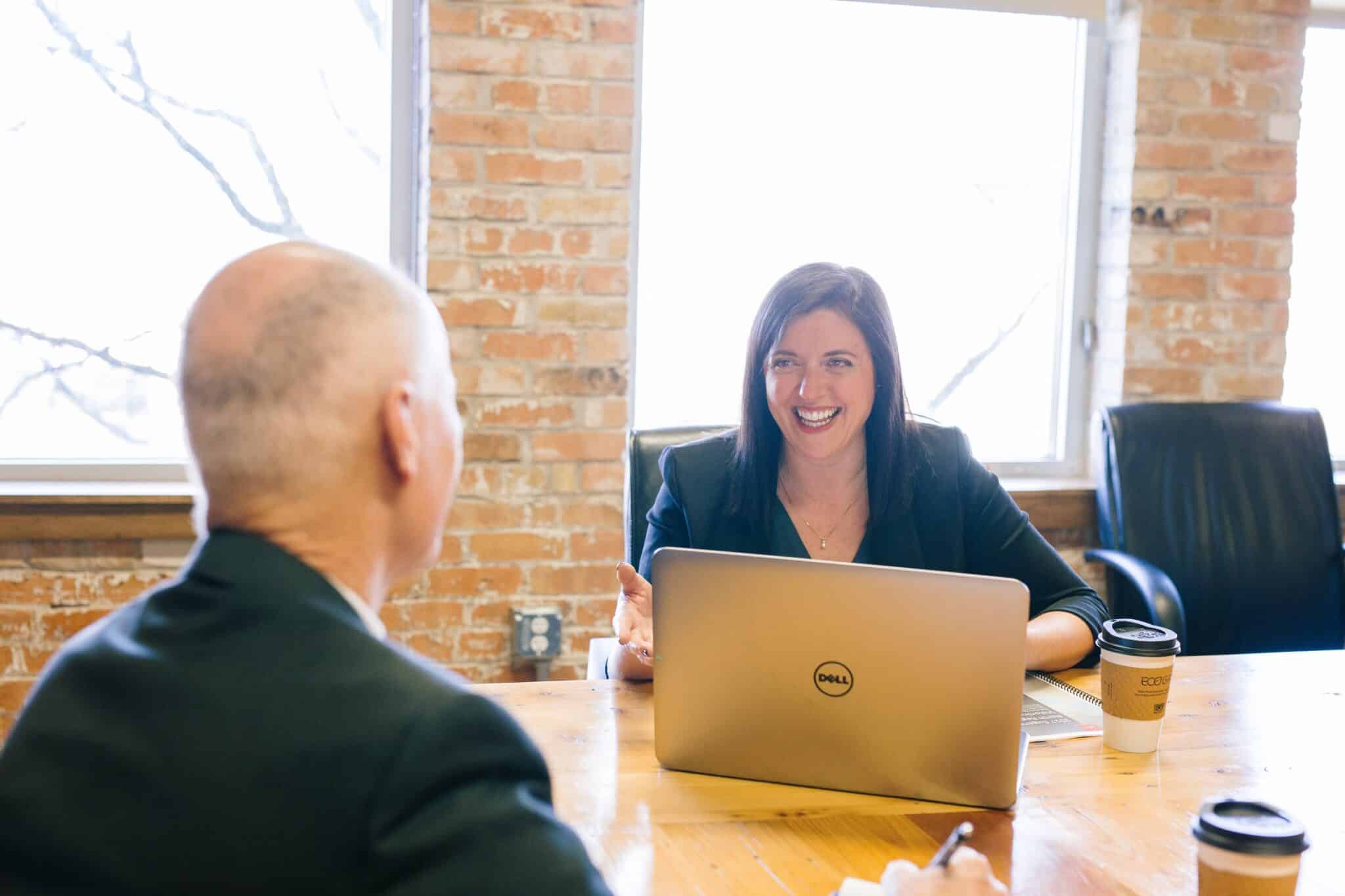 work colleagues smiling during a meeting