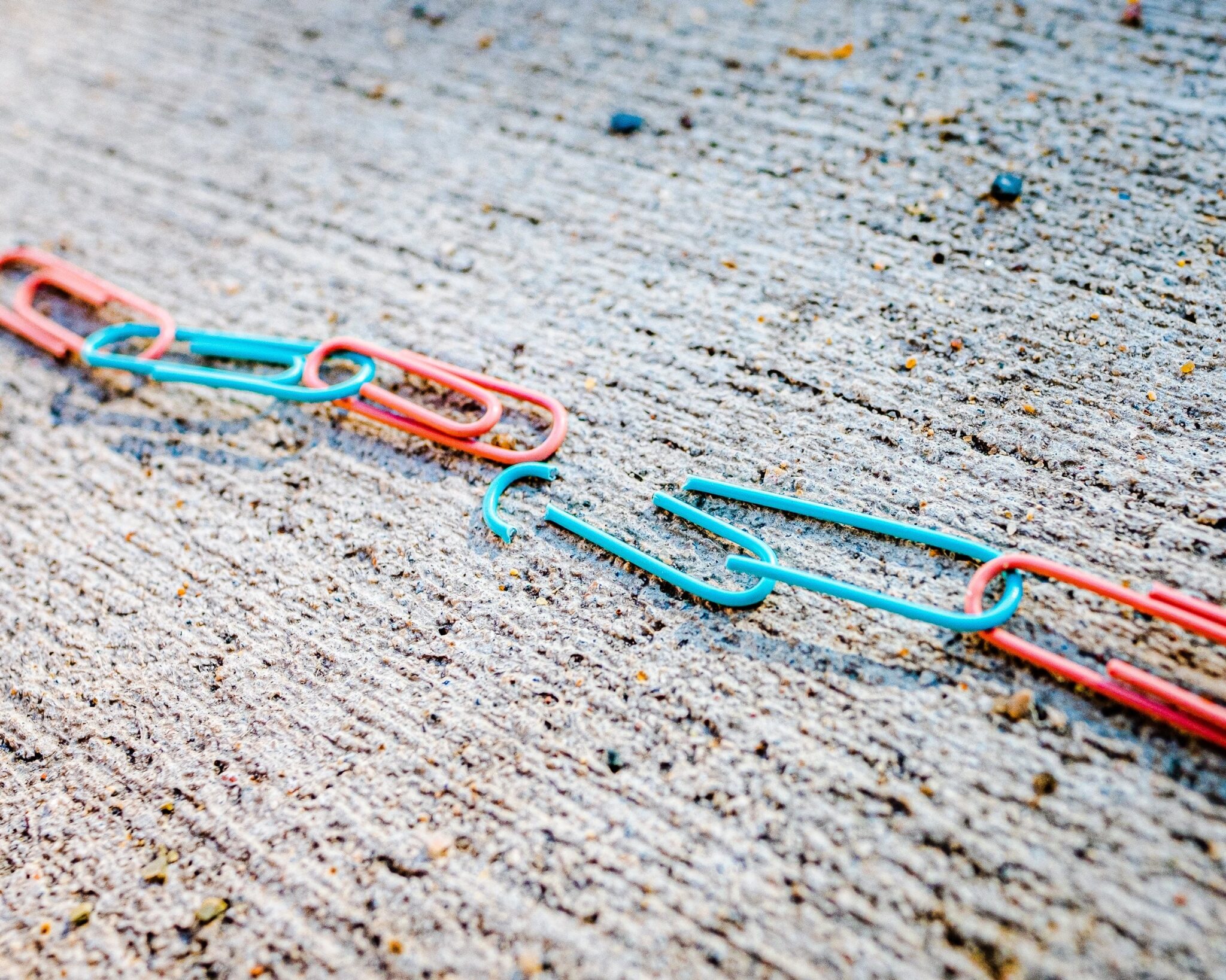 broken chain of paper clips