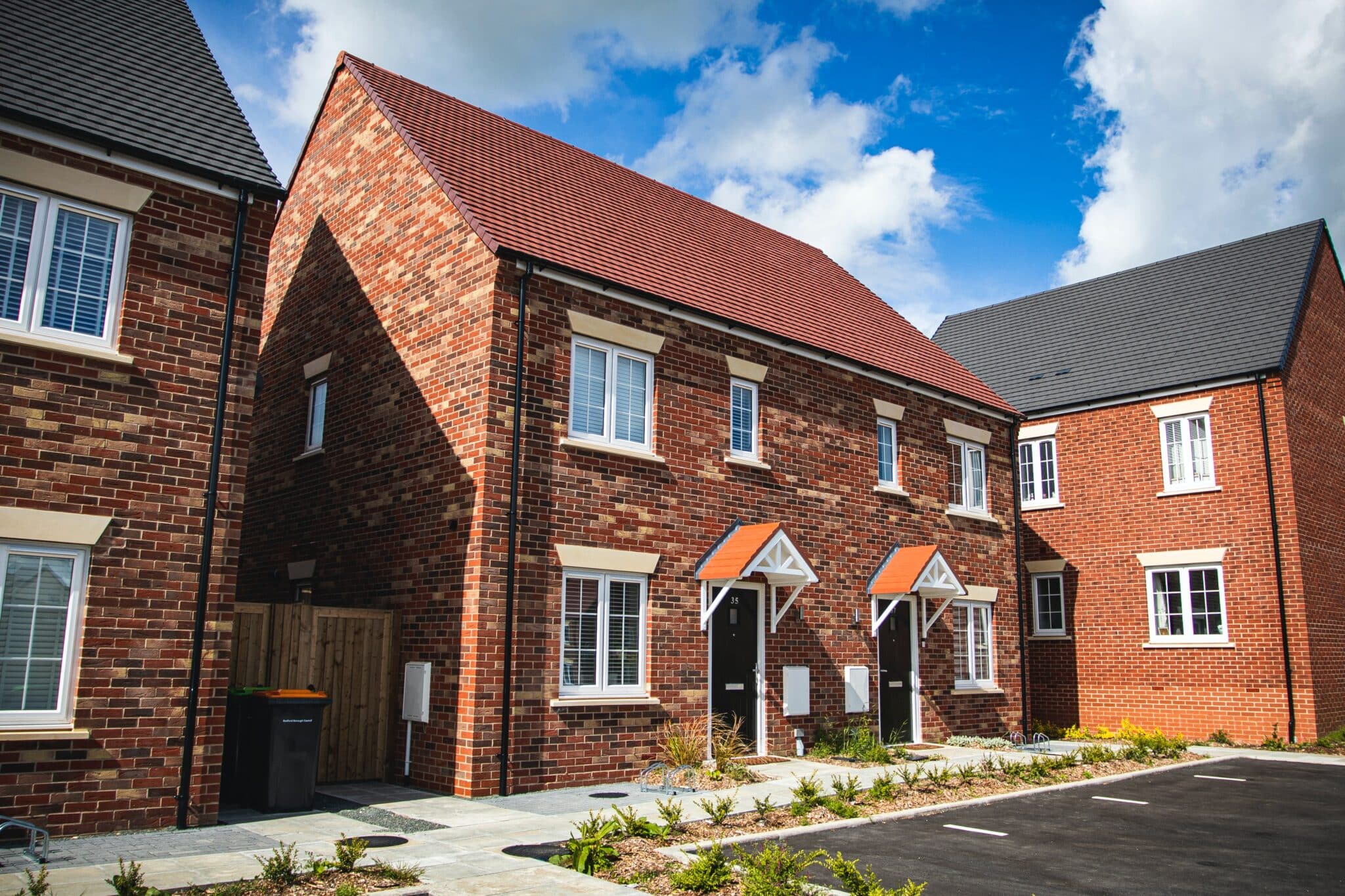 modern semi-detatched properties on a new housing development in the uk
