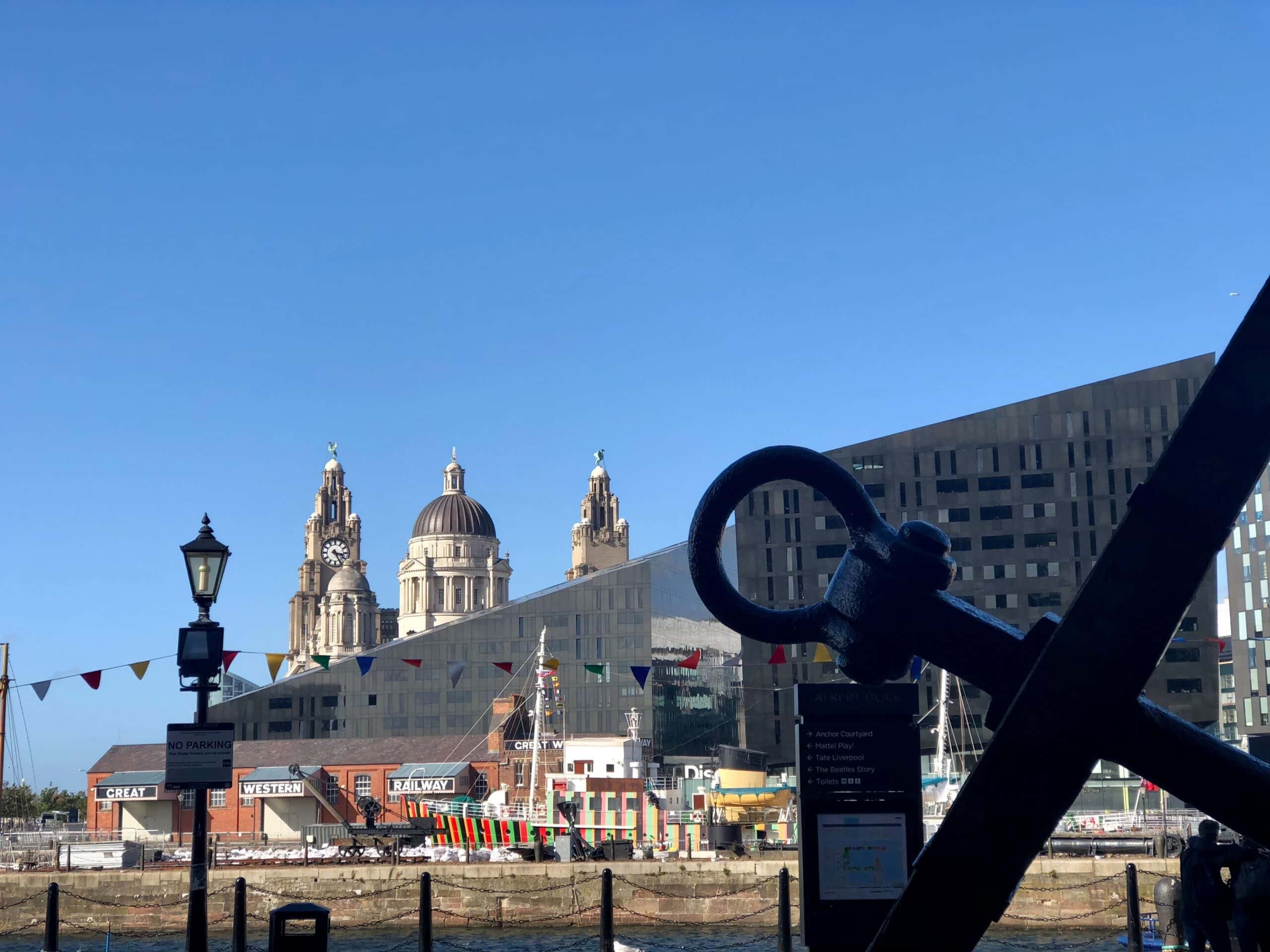 sunny view of liverpools famous liver birds and albert dock